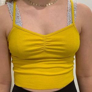 Super cute and stretchy yellow tank